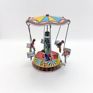 Knox and Floyd Tin Carousel Wind-up Mechanical Toy with Original Box.
